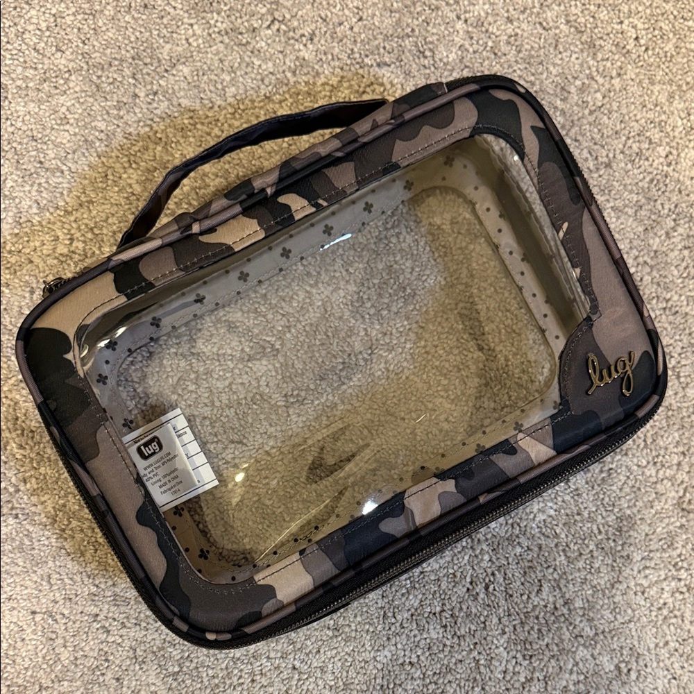NWOT. Lug. Clear zipper storage. Camo midnight.